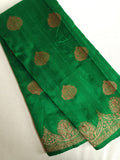 Banarasi Dupion saree in dark green with gold Zari border and motifs