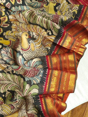 A classic kanchi kalamkari saree with a pure Patola blouse