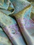 Stunning meenakari kanjeevaram in pastel green and lavender hues