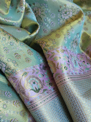 Stunning meenakari kanjeevaram in pastel green and lavender hues