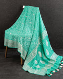 Teal green Banarasi chiffon saree with chikankari work all over