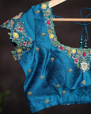 Dark blue blouse with intricate cutwork embroidery