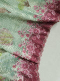 Crush tissue saree in aqua green with floral cutwork border