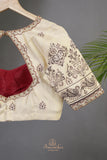 Tmeless kanjeevaram in a maroon shade