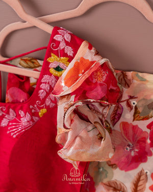 Beige Floral Chinnon saree with a contrast tomato pink handwork blouse