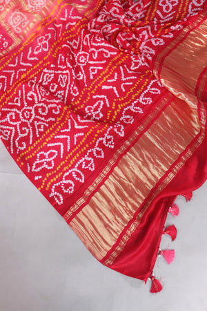 Bandini gharchola on gaji silk in hues of peach and pink