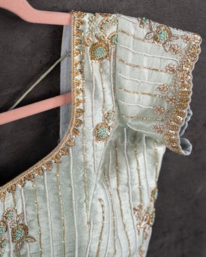 Chikankari georgette saree in light powder blue with beautifully woven sequins