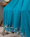 Peacock Blue Satin Organza saree with multi color cutdana work border