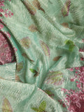 Crush tissue saree in aqua green with floral cutwork border