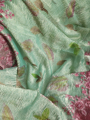 Crush tissue saree in aqua green with floral cutwork border