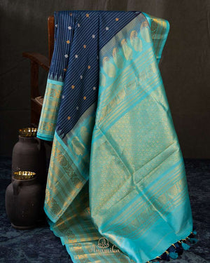 Timeless Gadwal Pattu saree in deep navy and teal blue