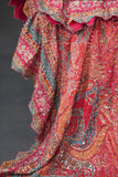 Designer Georgette Saree in hues of orange, peach, red and pink