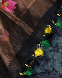 Muslin jamdaani saree in black with all over floral weave