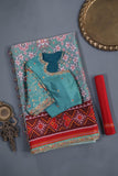 A classic patola in aqua blue with a striking contrast red