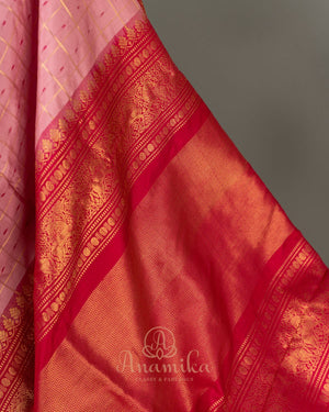 Light baby pink Kanchipattu saree with a contrast dark pink border