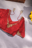 A stunning jewelry work blouse in red