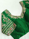 A stunning blouse in leaf green color with beautiful embroidery