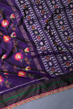 A classic patola in purple with a striking border