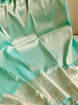 Pastel blue kanjeevaram with heavy bridal work blouse