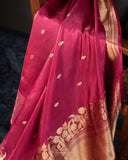 Raw mango pattu saree in a lovely shade of pink paired with a contrast floral blouse