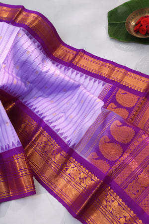 Timeless Gadwal Pattu saree in lavender and plum combo