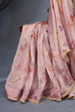 A dreamy floral organza in beautiful shades of dusty rose pink