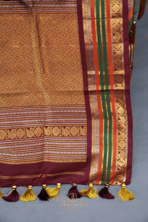 Gadwal Pattu saree in yellow and brown