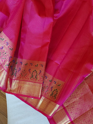 Kanjeevaram in a beautiful shade of majenta with a woven paithani styled border