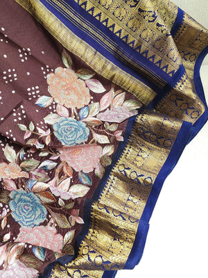 Kanjeevaram in a beautiful shade of brown with a dark blue border