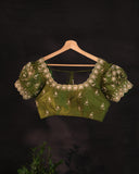 Soft organza saree in green with a beautifully embroidered blouse