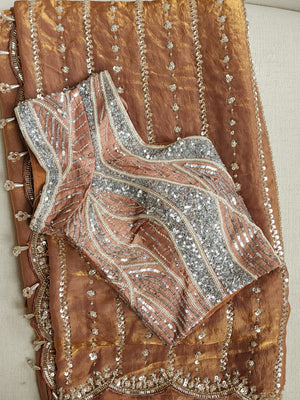 Copper Brown tissue saree with all over sequins embroidery