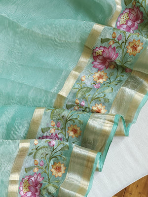 Sea Green Crush Tissue saree with a beautiful floral embroidered border