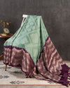 Sage Green Kanchi Bandini saree with a stunning purple border