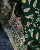 Banarasi Silk Saree in a dark emerald color