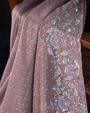 Brocade tissue georgette sarees with intricately embroidered border