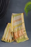 A lovely organza saree in shaded yellow with a dark blue designer blouse