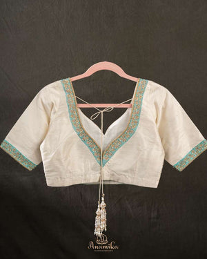 Off white blouse with blue patchwork embroidery