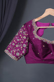 A classic patola in purple with a striking border