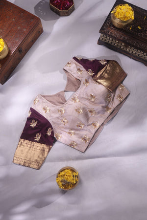 Kanchipattu saree in a lovely shade of light peach with a contrast dark maroon border