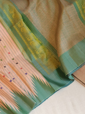 Gadwal saree in peach with beautiful contrast green temple borders