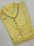 Lovely yellow silk kurta with Zari lines and hand embroidery across the neckline.