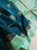 Peacock Green with aqua blue rawsilk saree with a stylish blouse