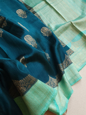 Peacock Green with aqua blue rawsilk saree with a stylish blouse