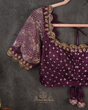 Sage Green Kanchi Bandini saree with a stunning purple border