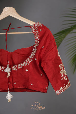 Patan Patola saree with intricately designed maggam work border