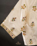 Off white blouse with beautifully designed Patola-inspired embroidery