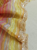 Multi colored pink hued Georgette saree with sequins border