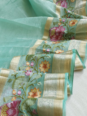 Sea Green Crush Tissue saree with a beautiful floral embroidered border