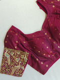A Royal Gadwal kanchi saree in sage green with rich magenta border