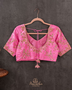 Gold kanjeevaram with contrast pink border and maggam work border